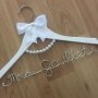 Audrey Pearl Coat Hanger With Bow Decoration